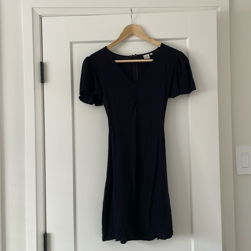 Little black dress. A-line, sleeves, lined, zipper and tie